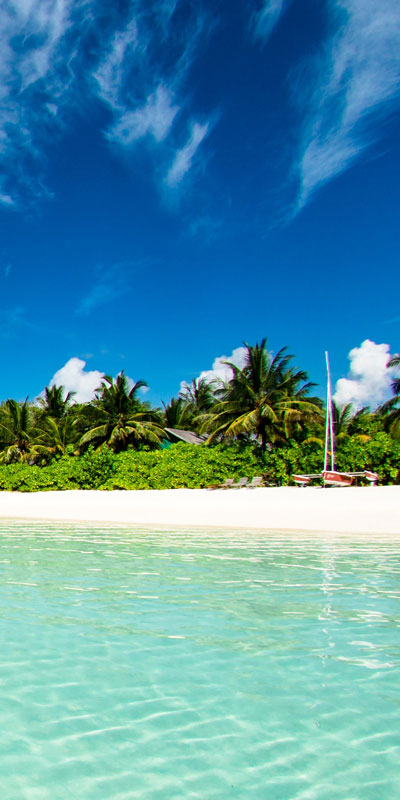 Sand and clear blue water